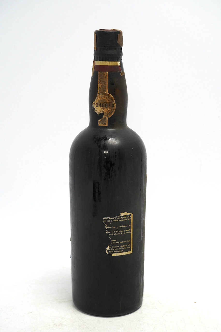 A bottle of 1927 Garrafeira port. Condition - sealed, some damage to labels, but contents unknown